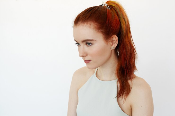 Side view handsome redhead teenage girl with multi coloured strand hair hipster student female with long ginger hair ponytail healthy skin looking aside youth beauty fashion trends 344912 1081